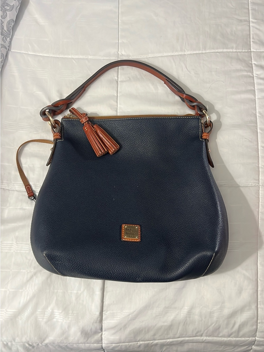 Navy and Tan Leather Hobo Bag with Tassel Detail